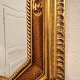 Mirror in wood and gilded stucco