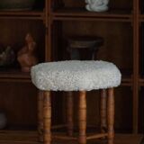 Modern Danish, a hexagonal oak stool, seat reupholstered in lambswool, 1950s.