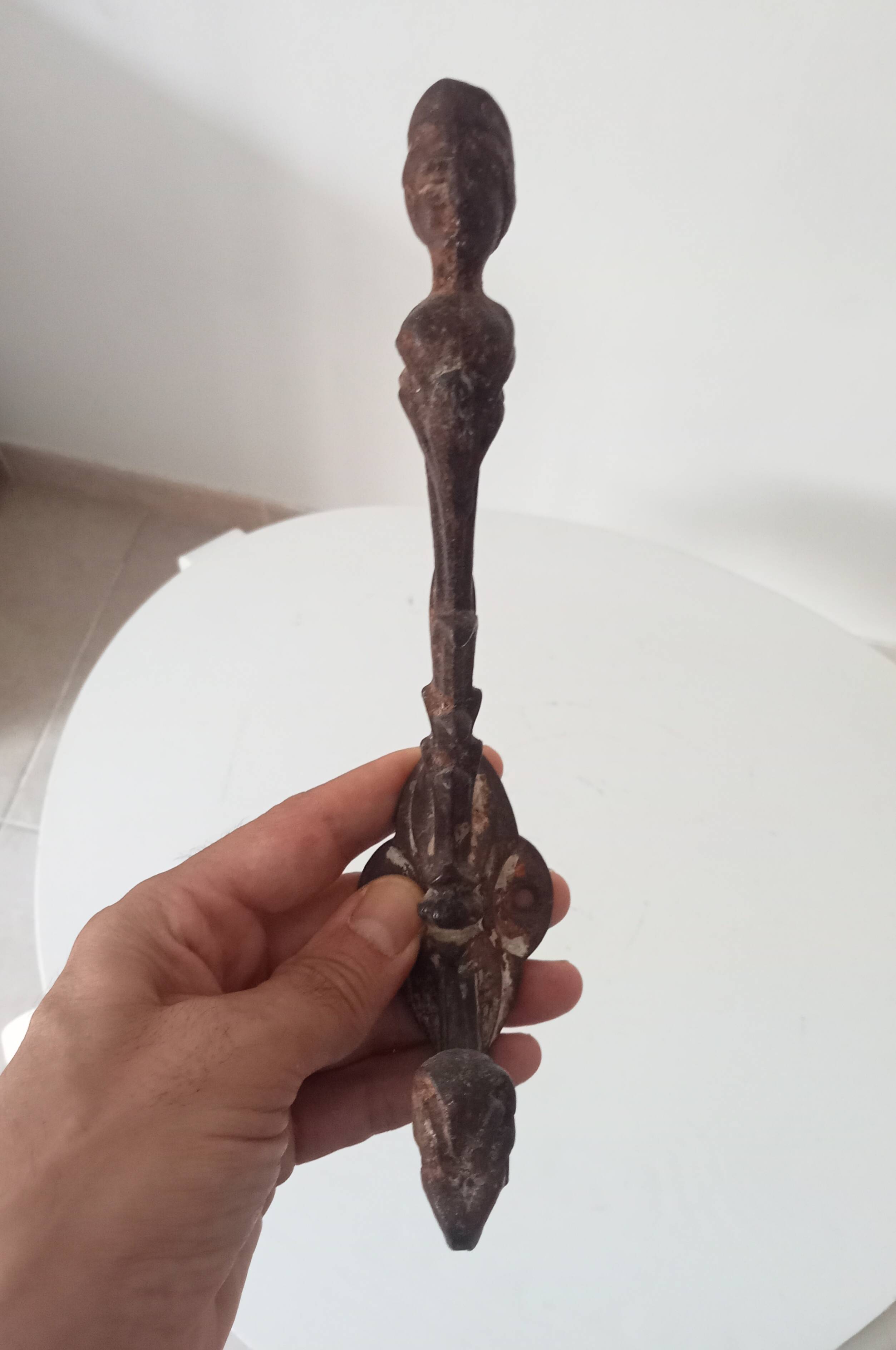 Antique wall coat hook from the 19th century in Victorian cast iron style.