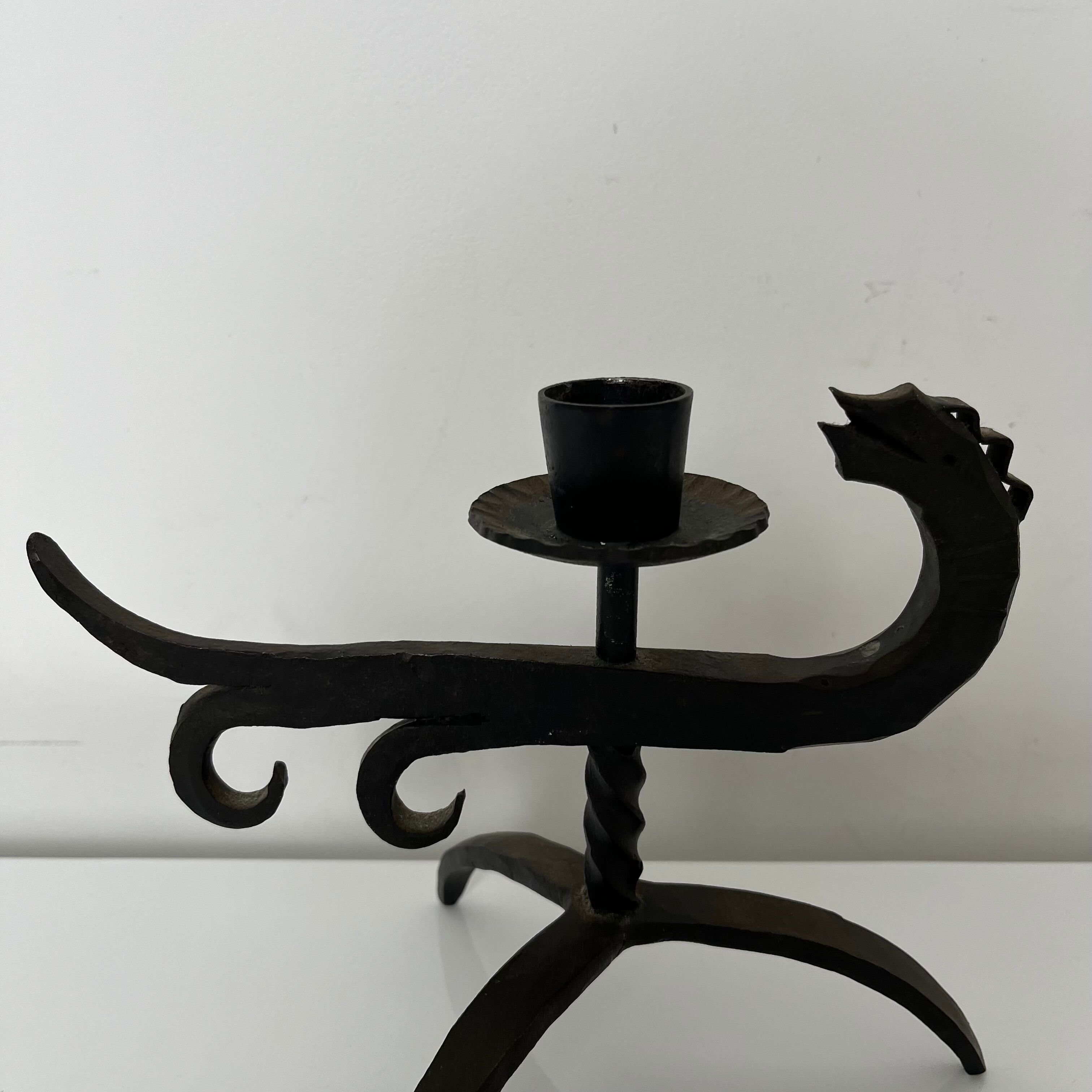 Zoomorphic dragon candle holder in wrought iron