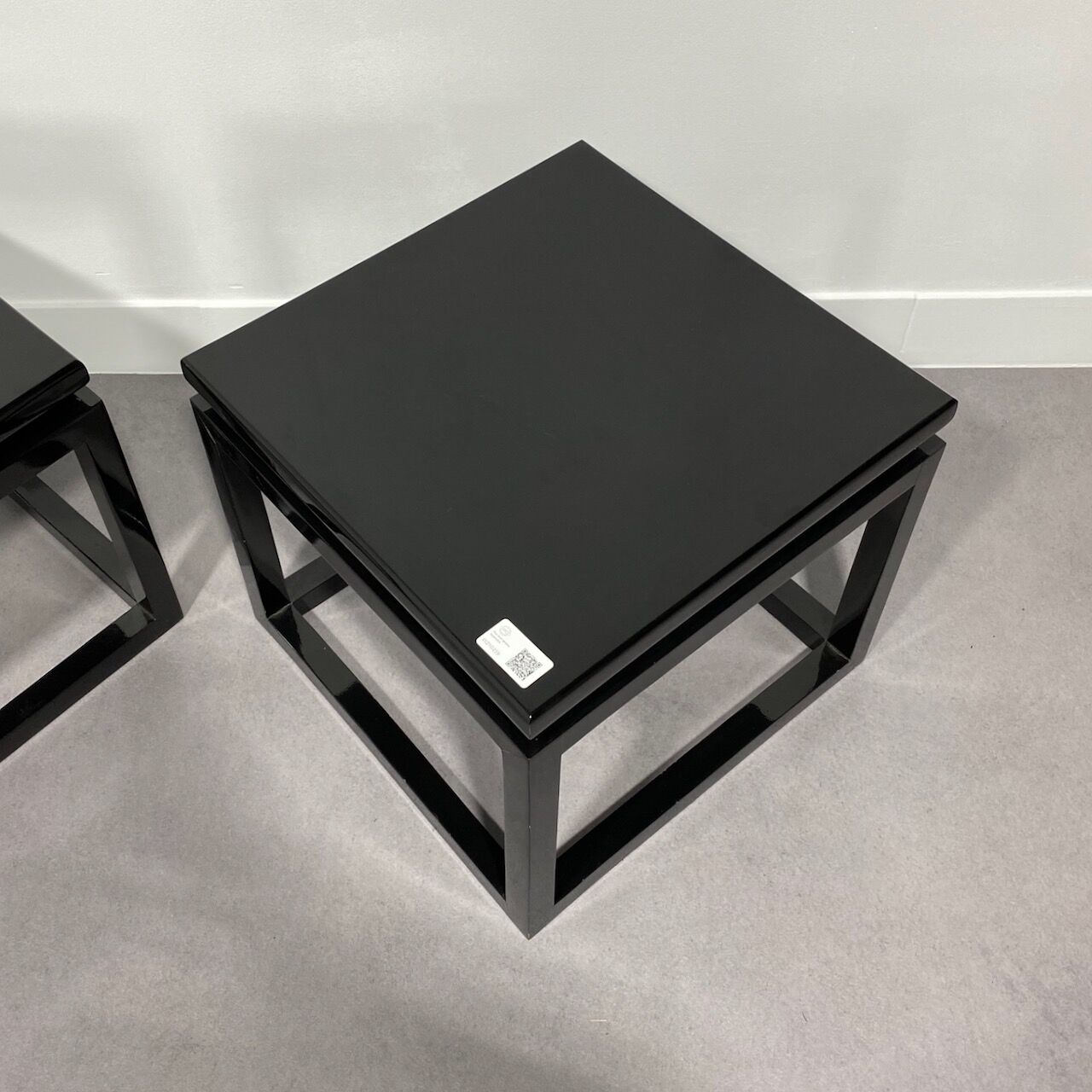 Pair black lacquered wood sidetables