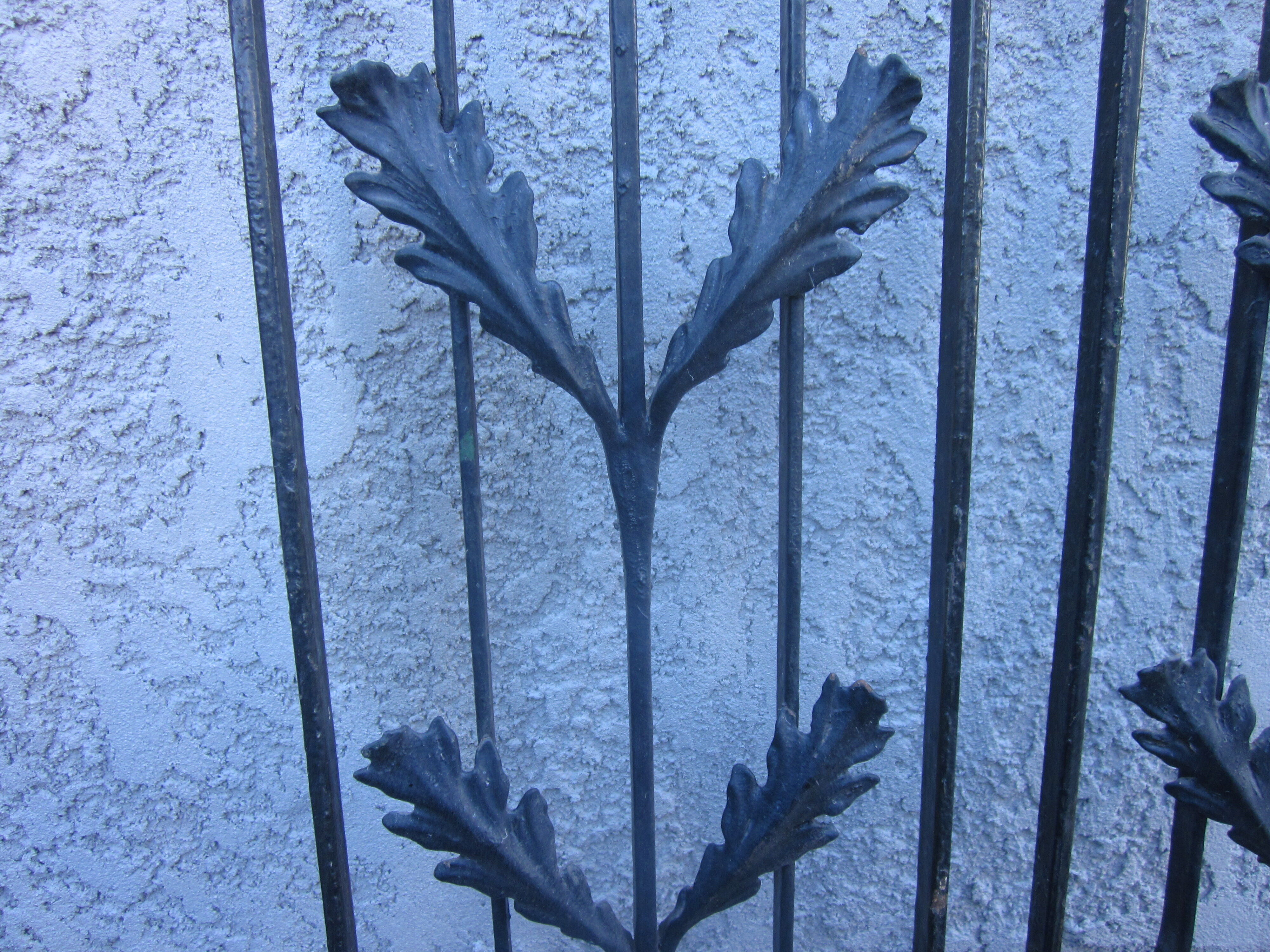 Pair of old wrought iron grid