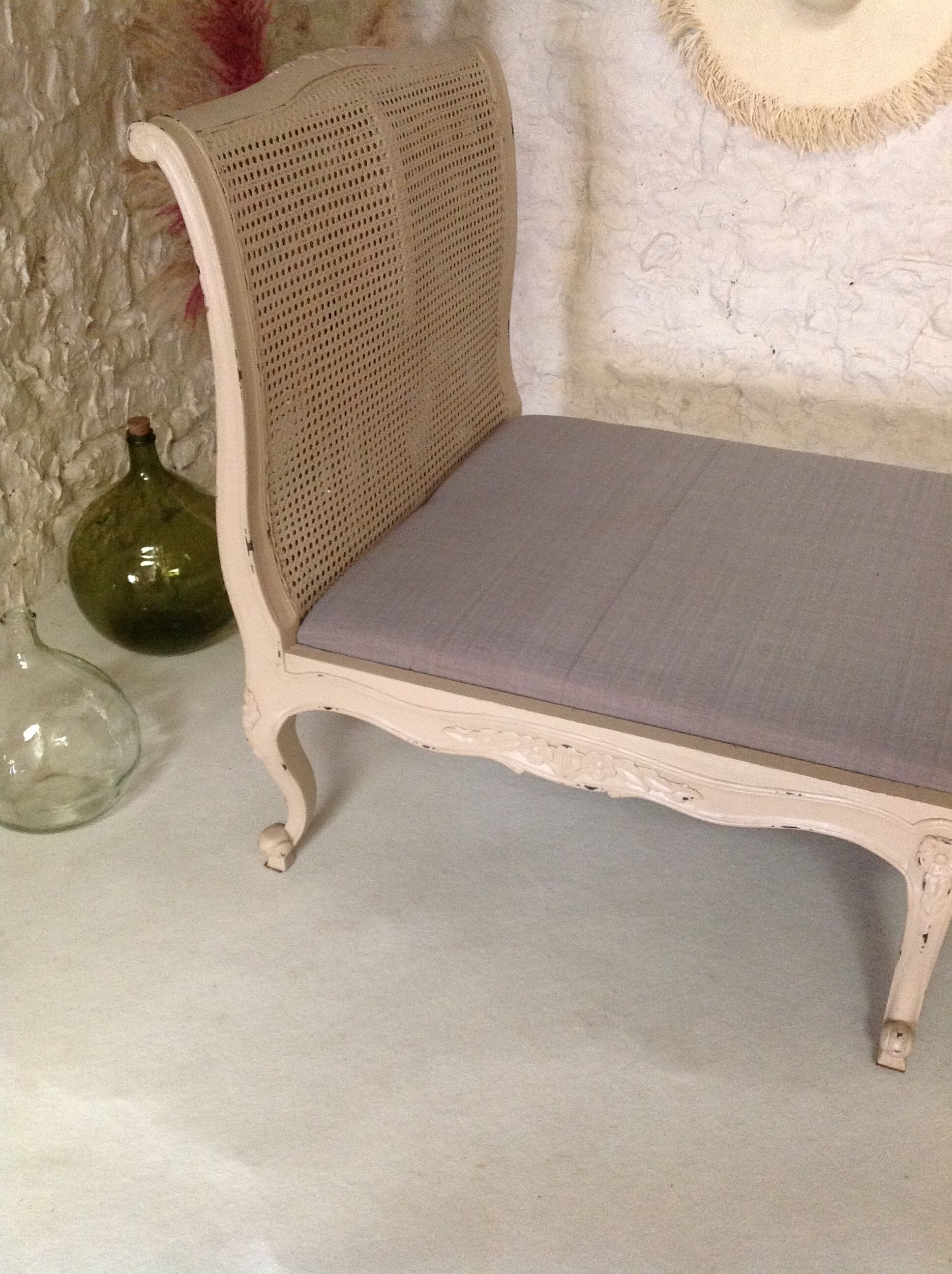 Carved wooden bench and caning bed