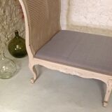 Carved wooden bench and caning bed