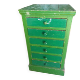 Vintage workshop furniture with 6 green drawers.