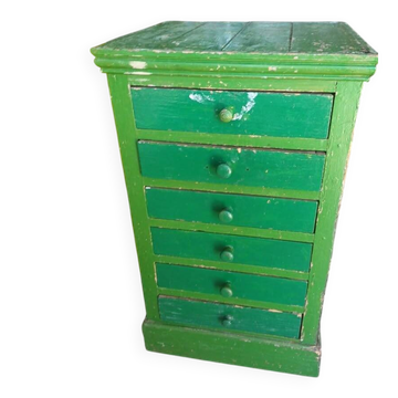 Vintage workshop furniture with 6 green drawers.