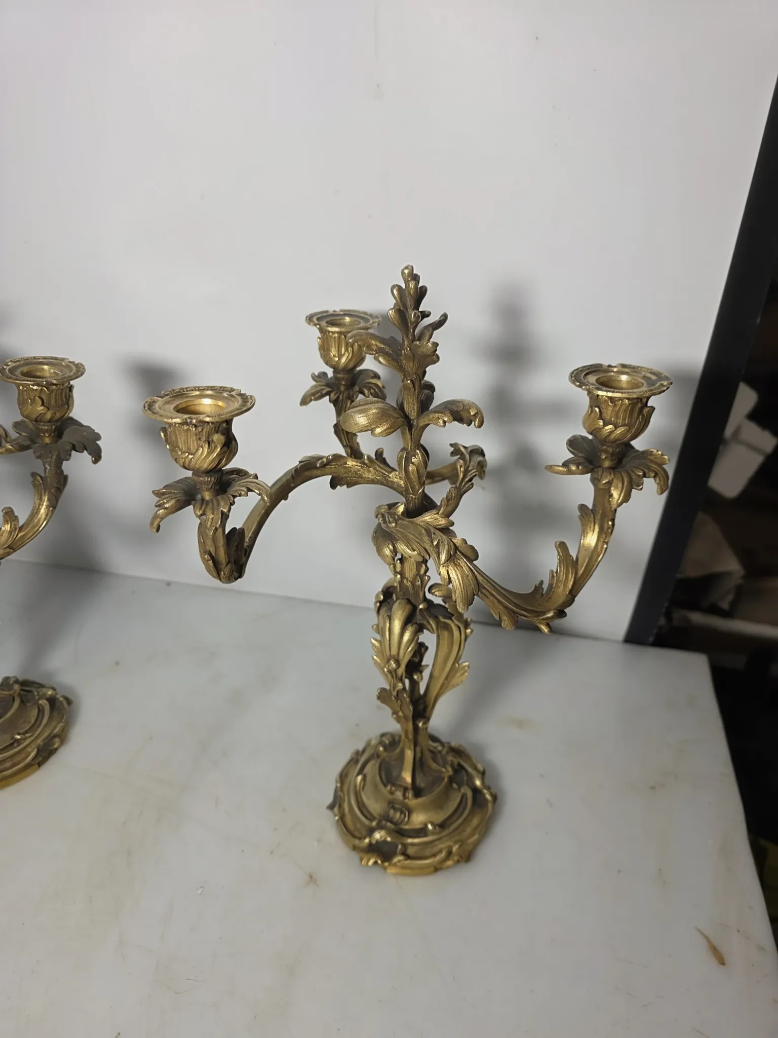 Pair of Louis XV style bronze candlesticks from the 19th century.