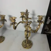 Pair of Louis XV style bronze candlesticks from the 19th century.
