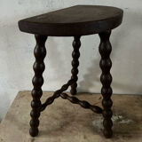 Wooden tripod farm stool