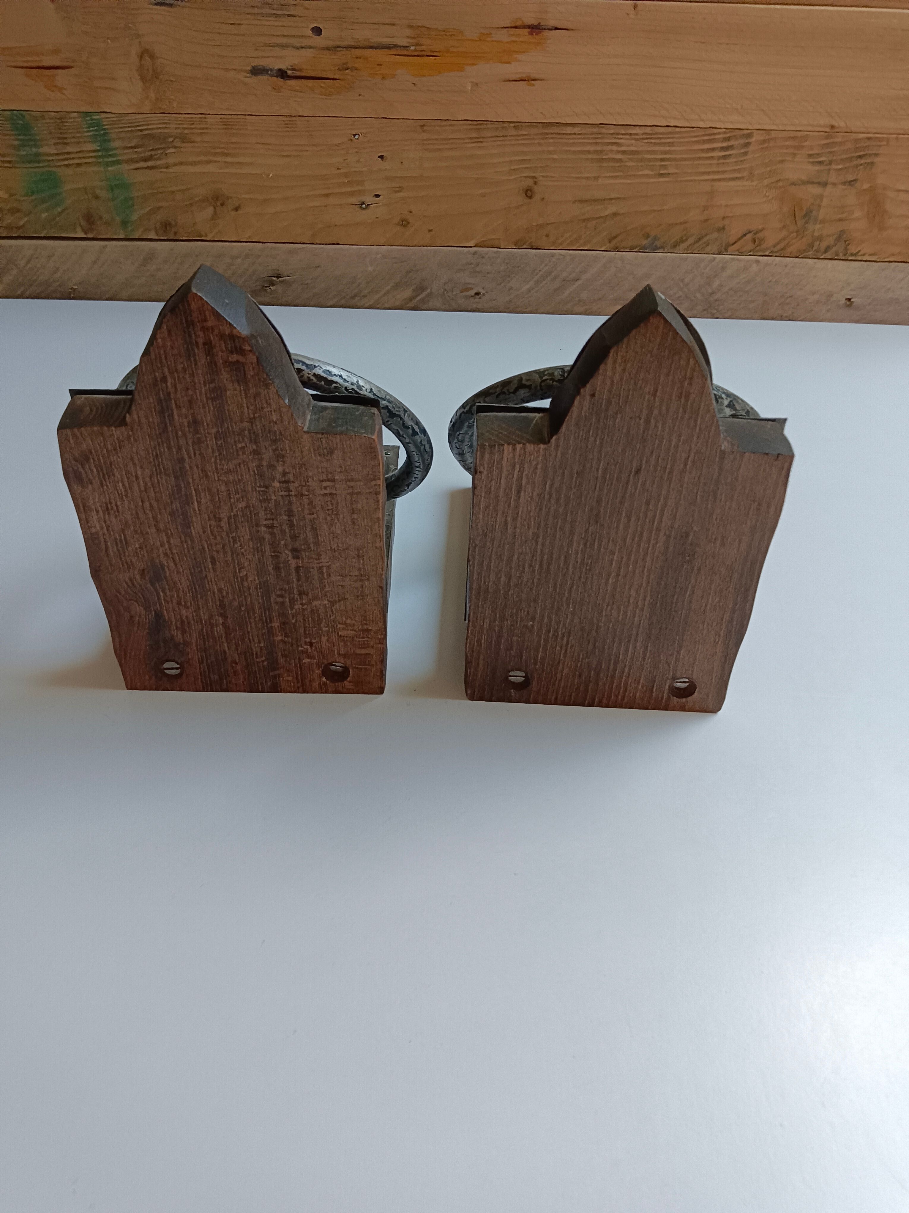 Medieval-style bookends, antique door handle.