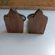 Medieval-style bookends, antique door handle.