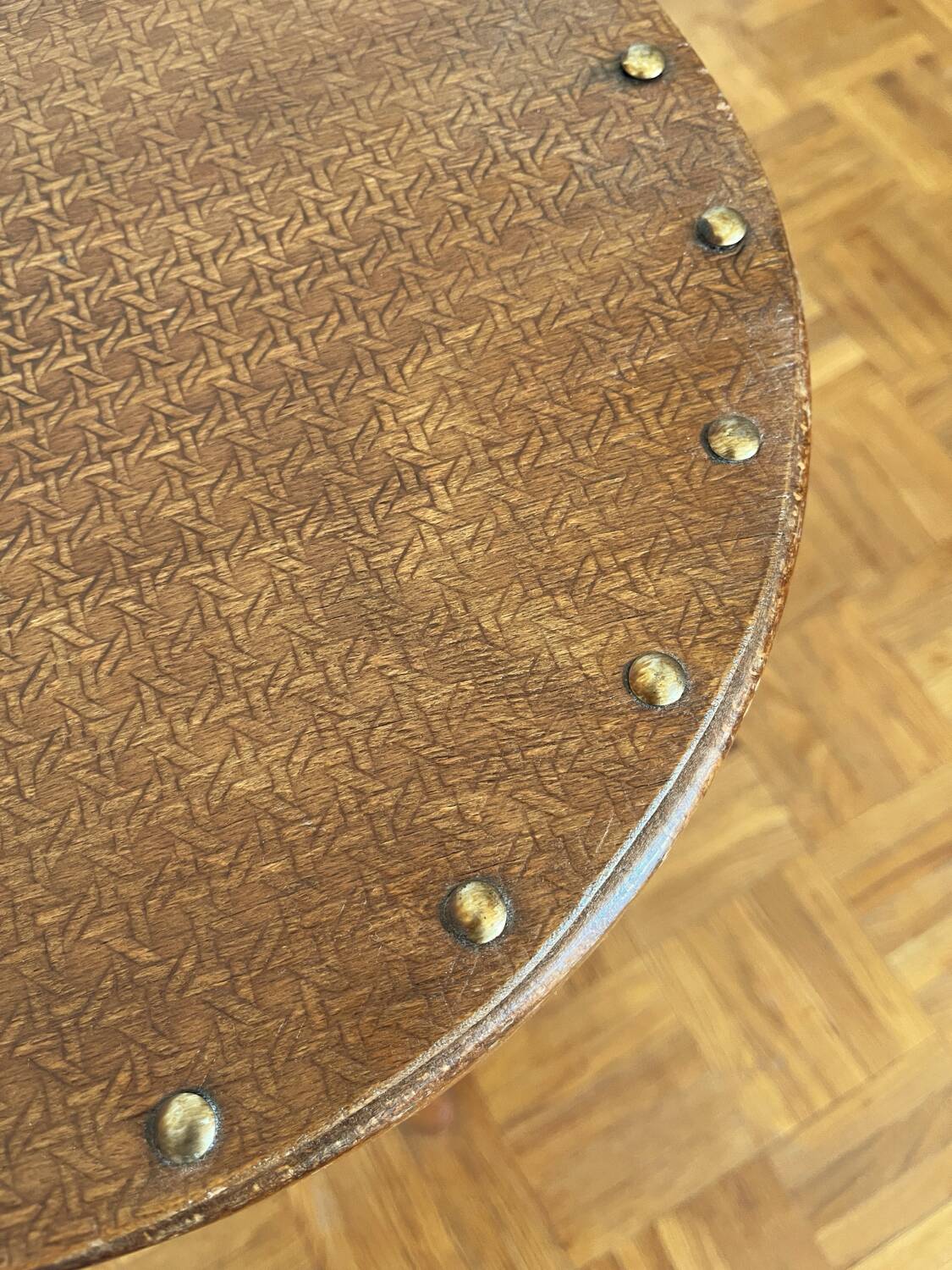 2 antique bistro stools with curved wood and caning effect.