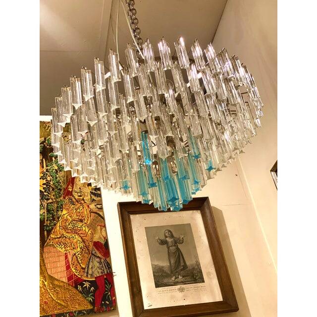 Contemporary transparent and ligh-blue triedro murano glass chandelier