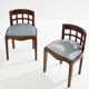 Paul T. Frankl pair of wavy walnut and mohair velvet chairs 1933
