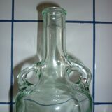 Bouteille ancienne en verre moulée transparente