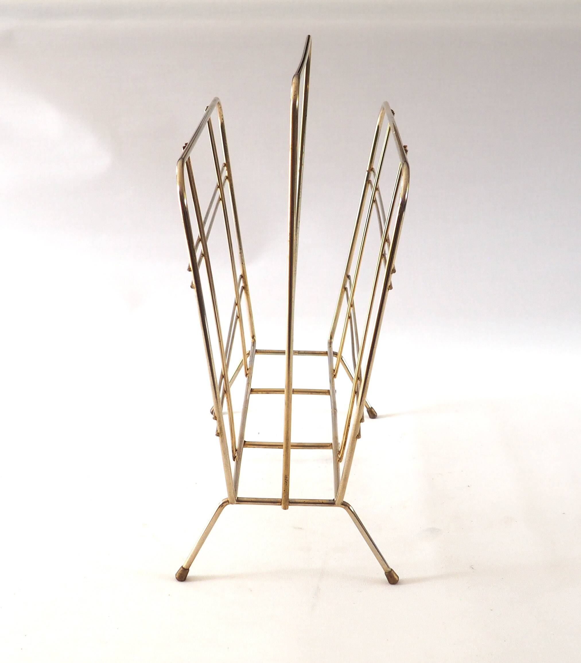Gold metal magazine rack