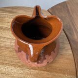 Glazed earthenware jug