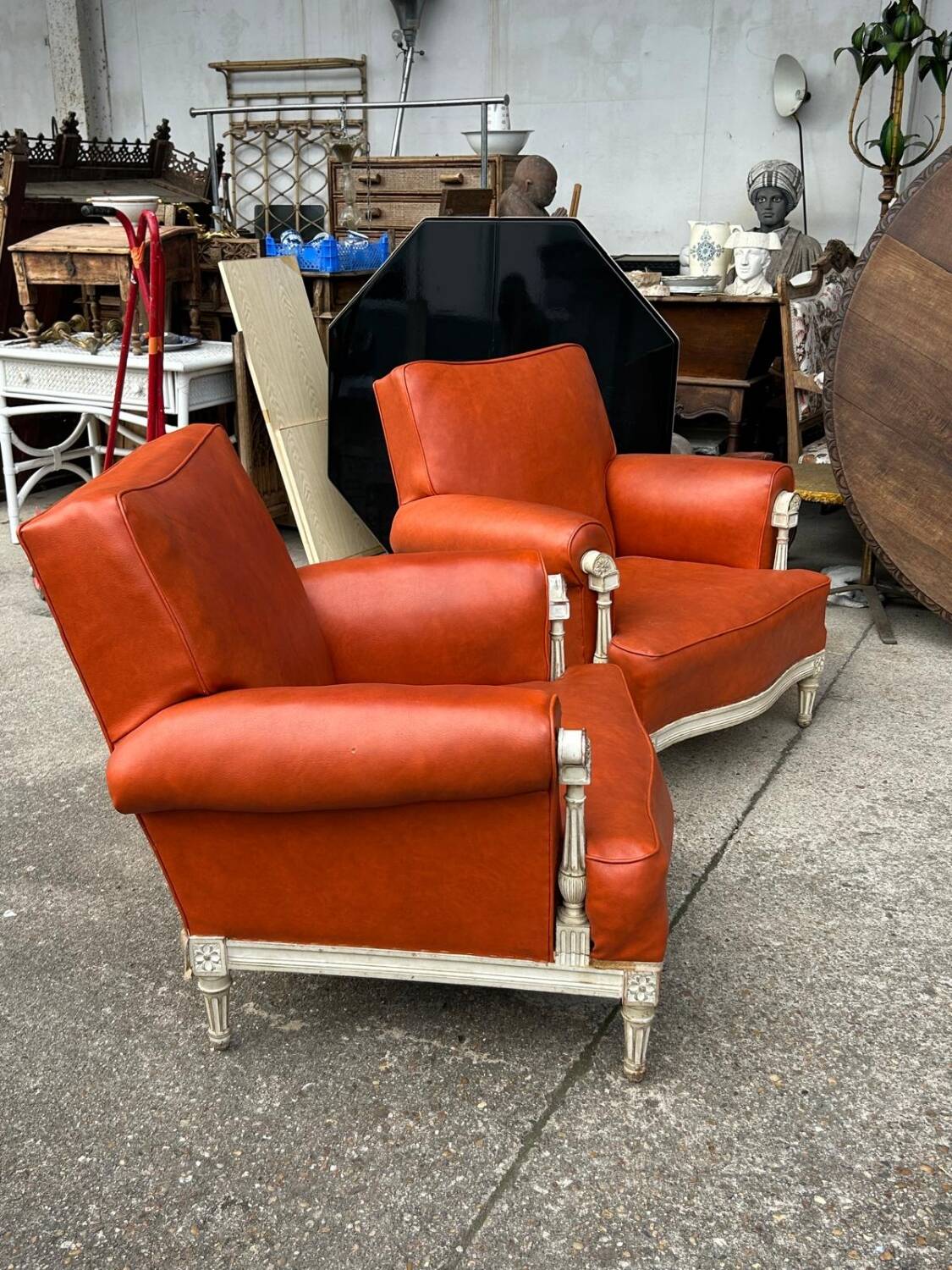 Pair of neoclassical bergère armchairs by Maison Jansen circa 1950.