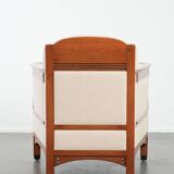 Art Nouveau design armchair with a luxurious light fabric upholstery