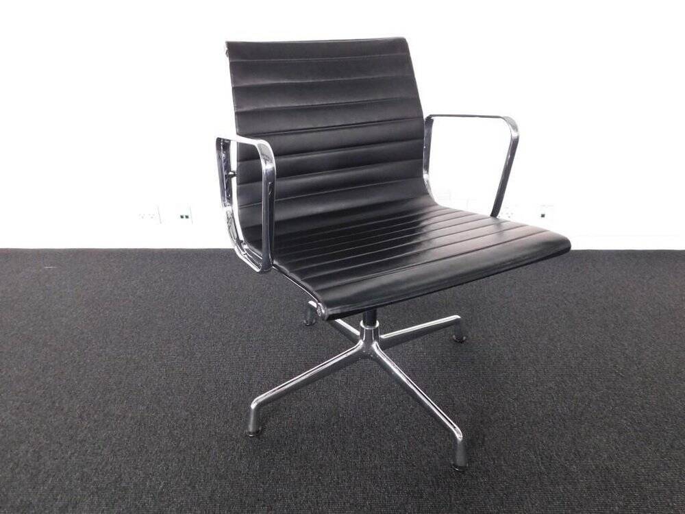 Vintage chair by charles eames ea 108 black leather edition vitra denmark