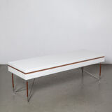 Low white presentation table or bench