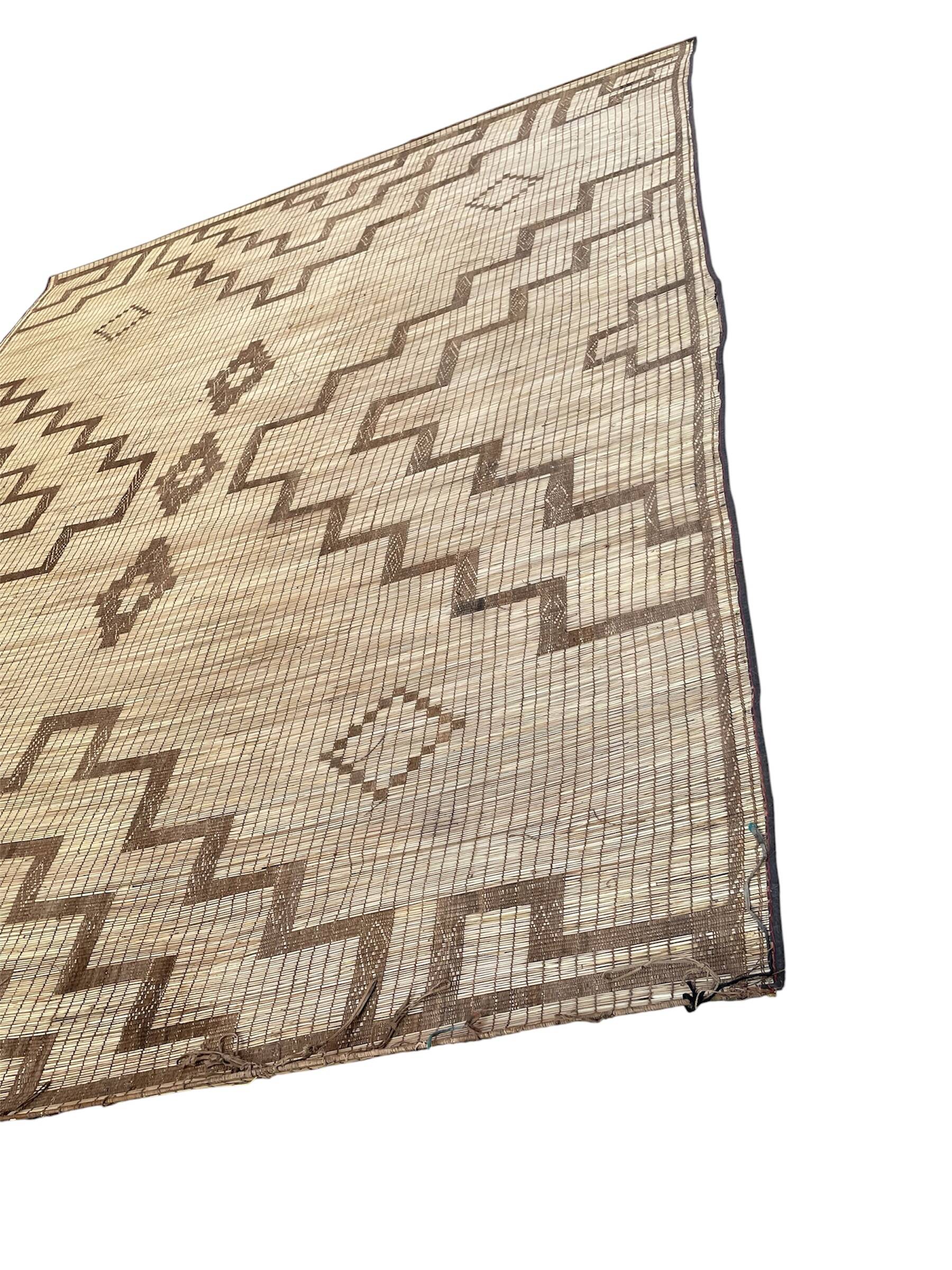 Vintage leather and reed Tuareg mat