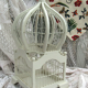 White bird cage wood metal