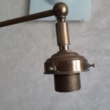 Articulated brass floor lamp