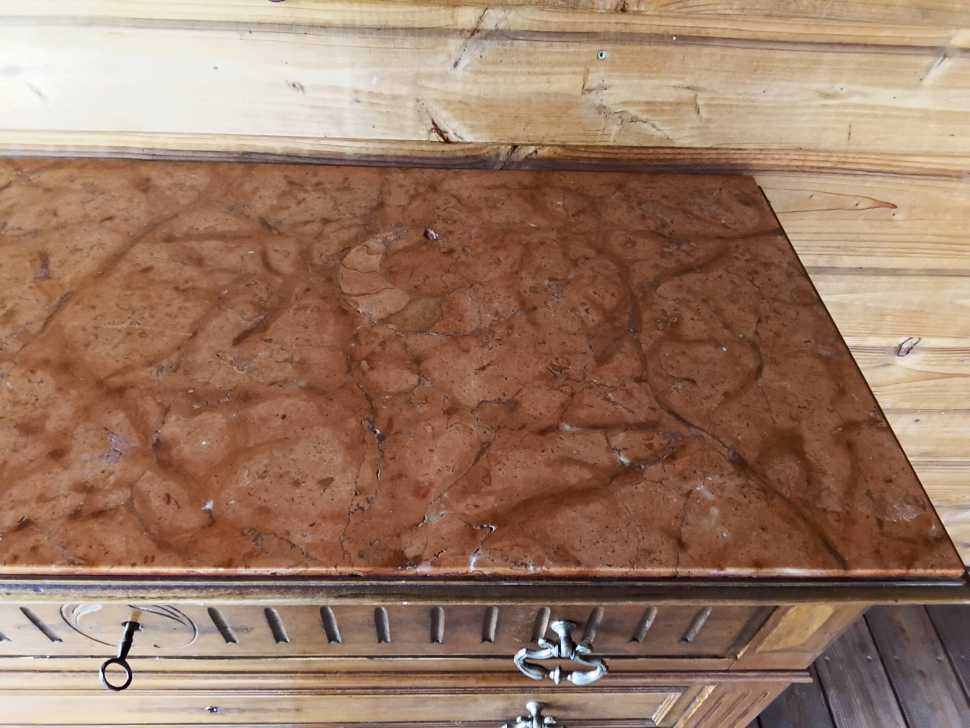 Antique chest of drawers with marble top