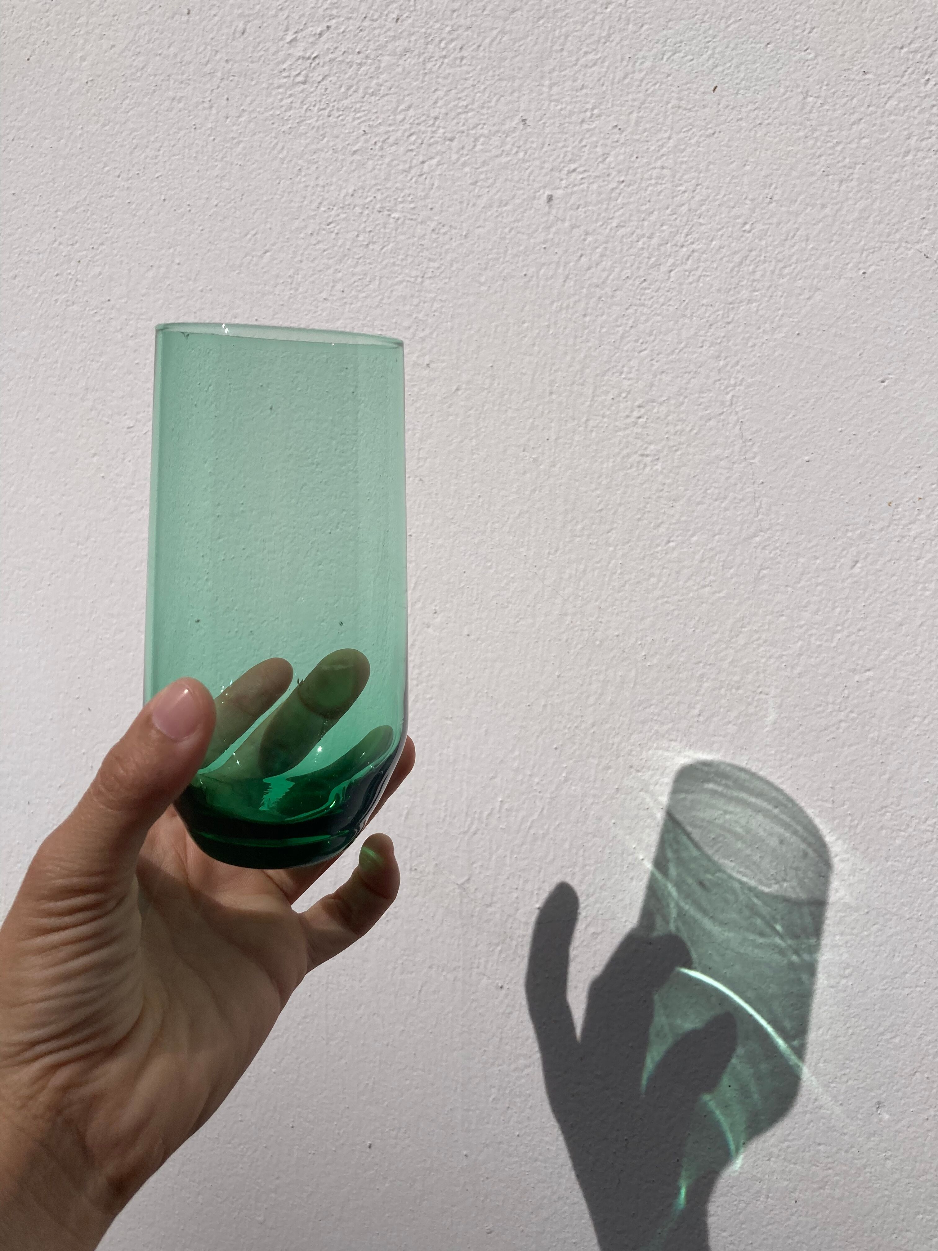 Crystal coloured water glasses in gilded metal glass holders 1970