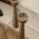 Pair of polished aluminium candlesticks
