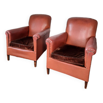 Pair of leatherette club chairs