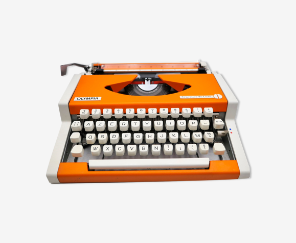 Machine à écrire Olympia traveller de luxe orange révisé et ruban neuf