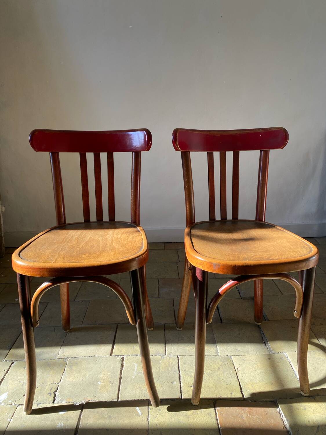Pair of red Fischel chairs