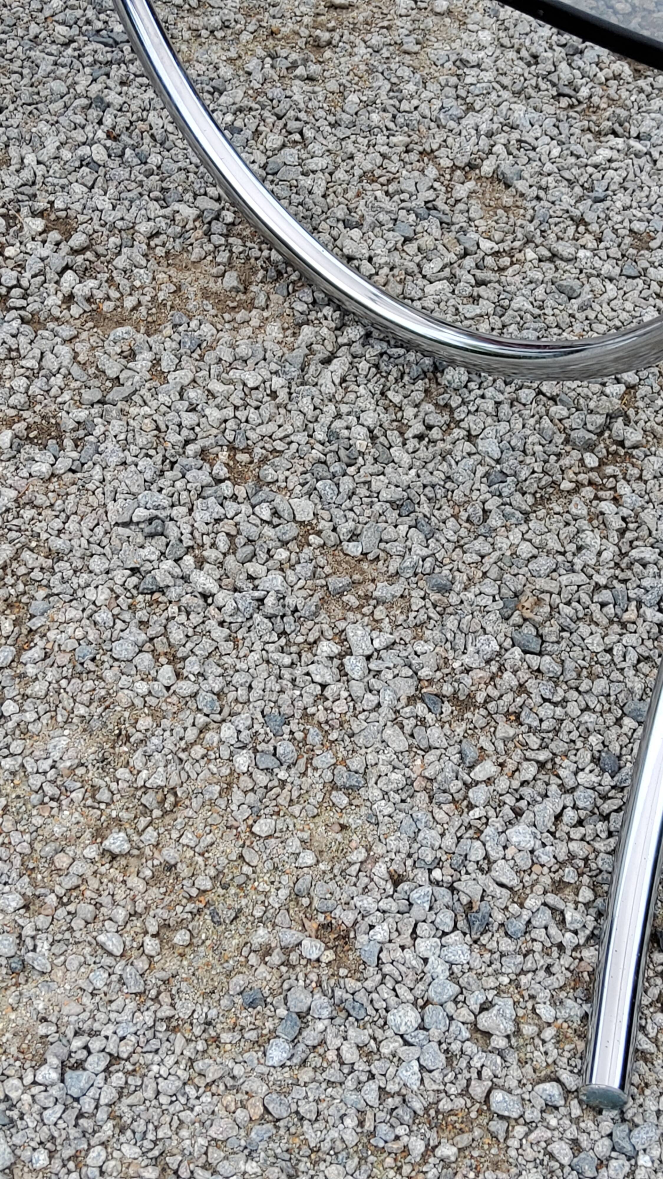 Dining table from the 70s top smoked glass base chrome