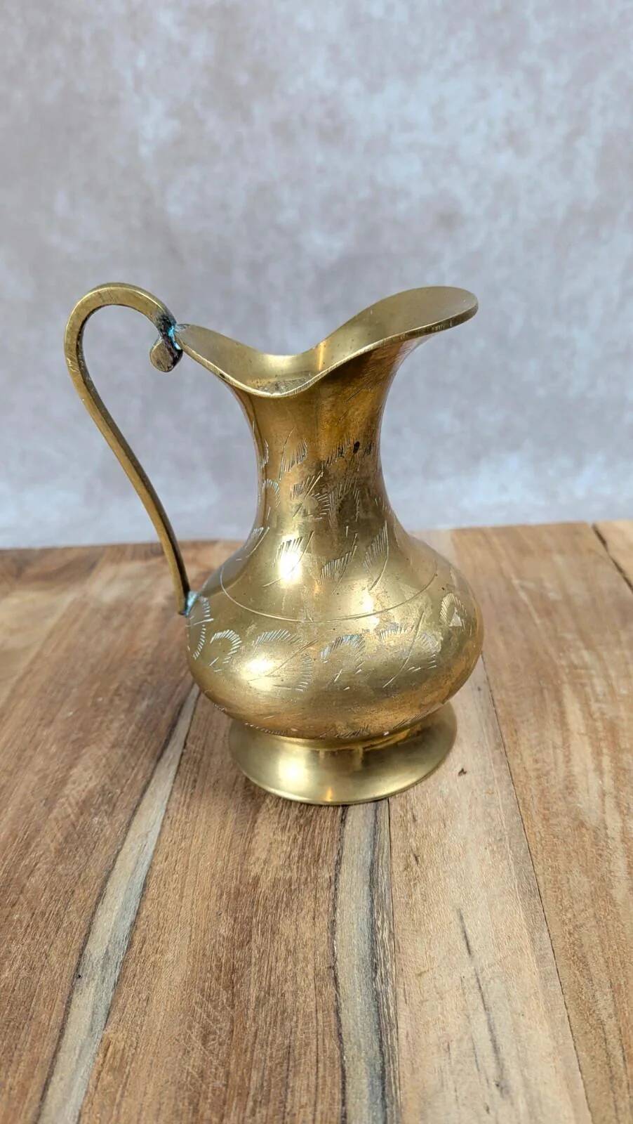 Small antique engraved brass jug