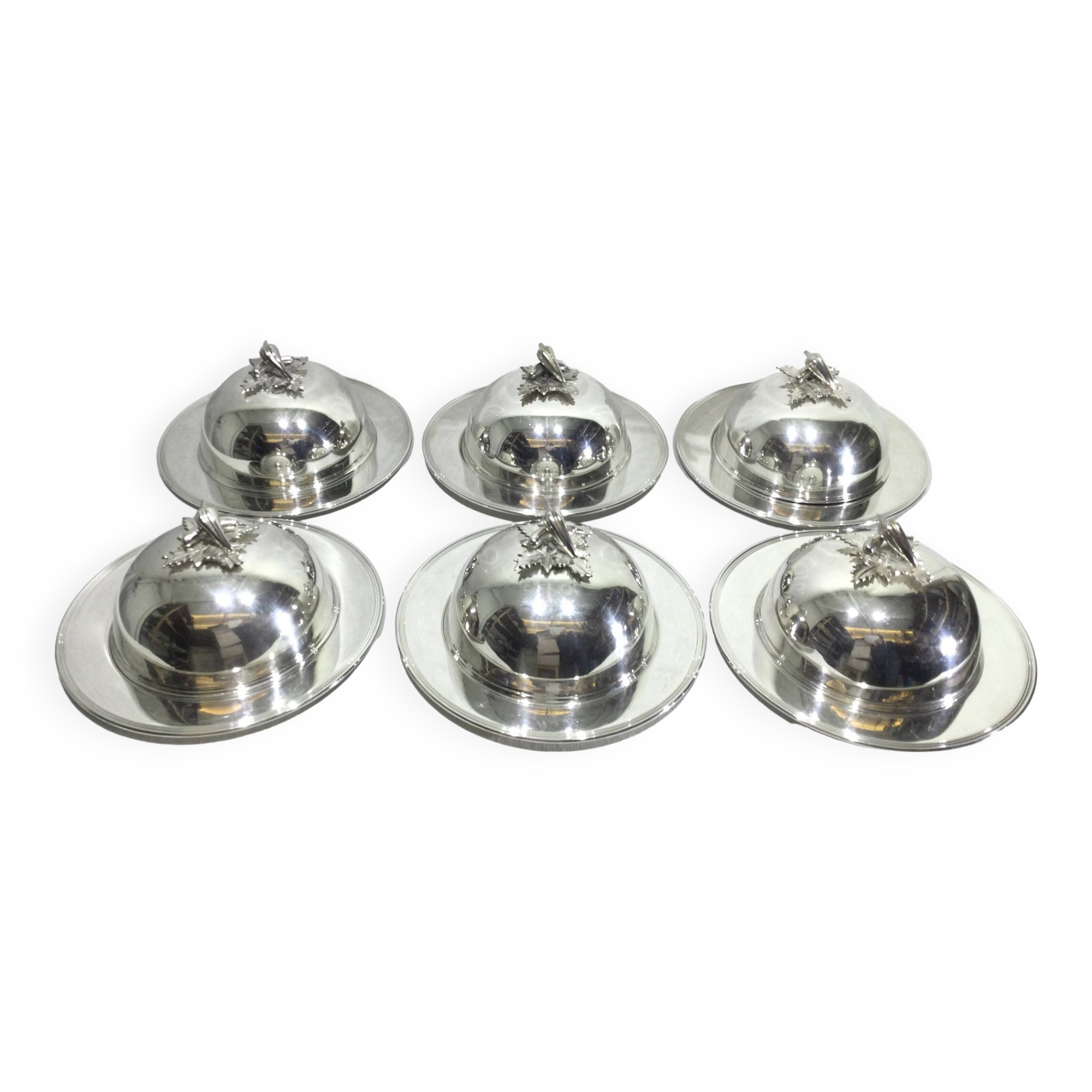 Set of silver-plated serving dishes and bells