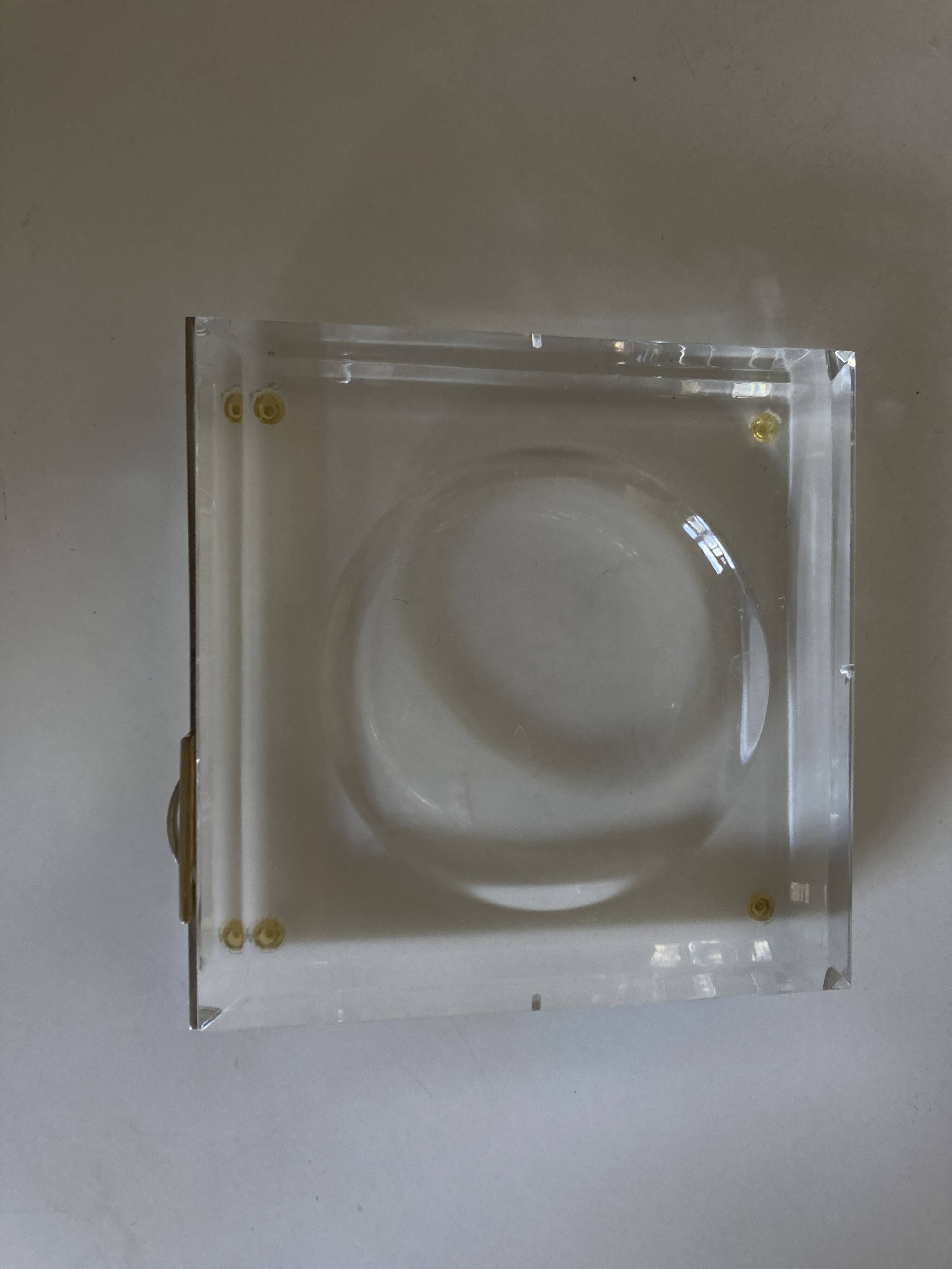 Plexiglas pocket emptier with brass and nickel silver surround, 1975, in the style of Pergay