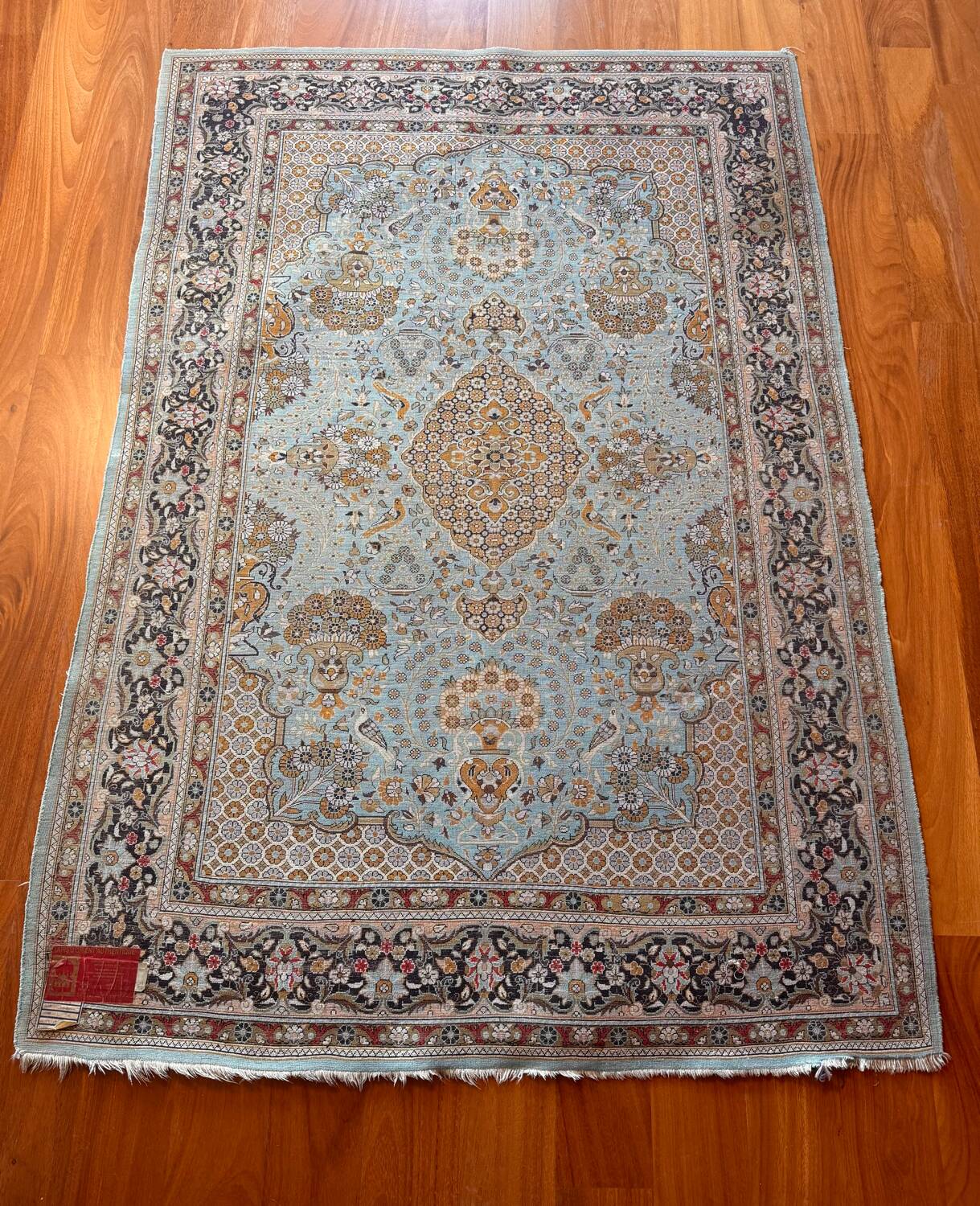 Antique Ghoum carpet from Iran in silk.