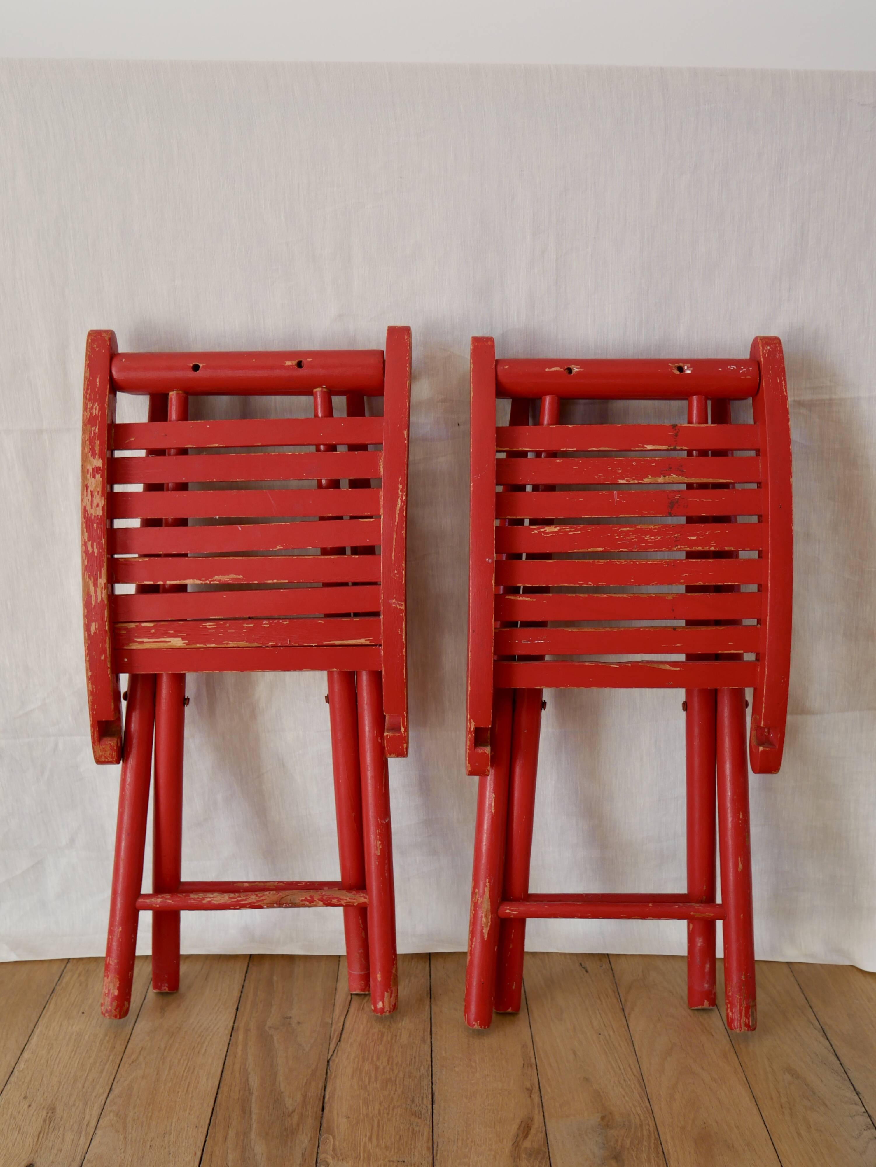 Paire de tabourets pliants de pêcheurs peints en rouge début XXème