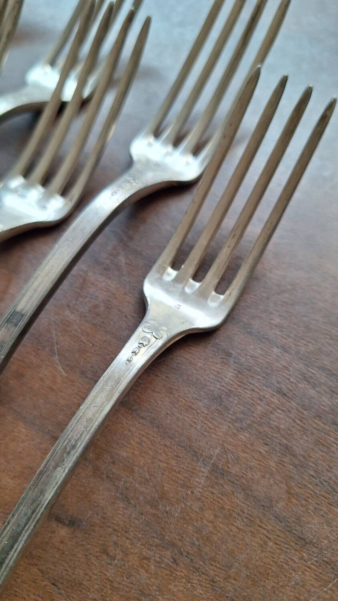 Set of silver metal forks