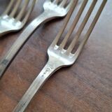 Set of silver metal forks