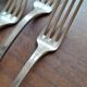 Set of silver metal forks