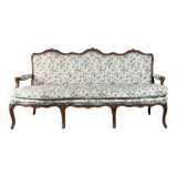 Louis XV bench in carved wood with oak patina, 18th century