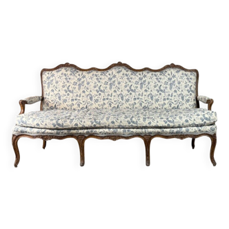 Louis XV bench in carved wood with oak patina, 18th century