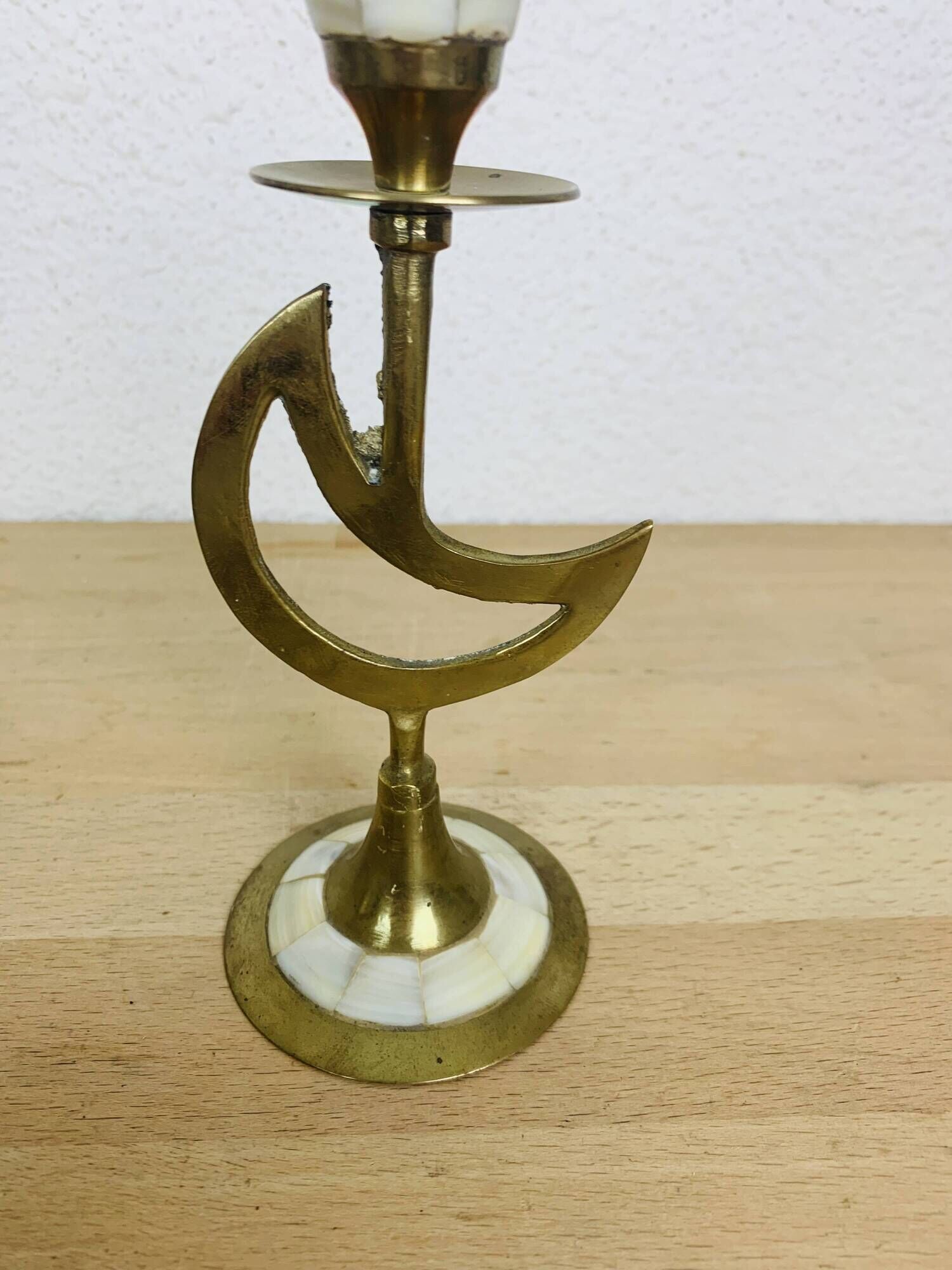 Pair of mother-of-pearl brass candlesticks with moon and sun