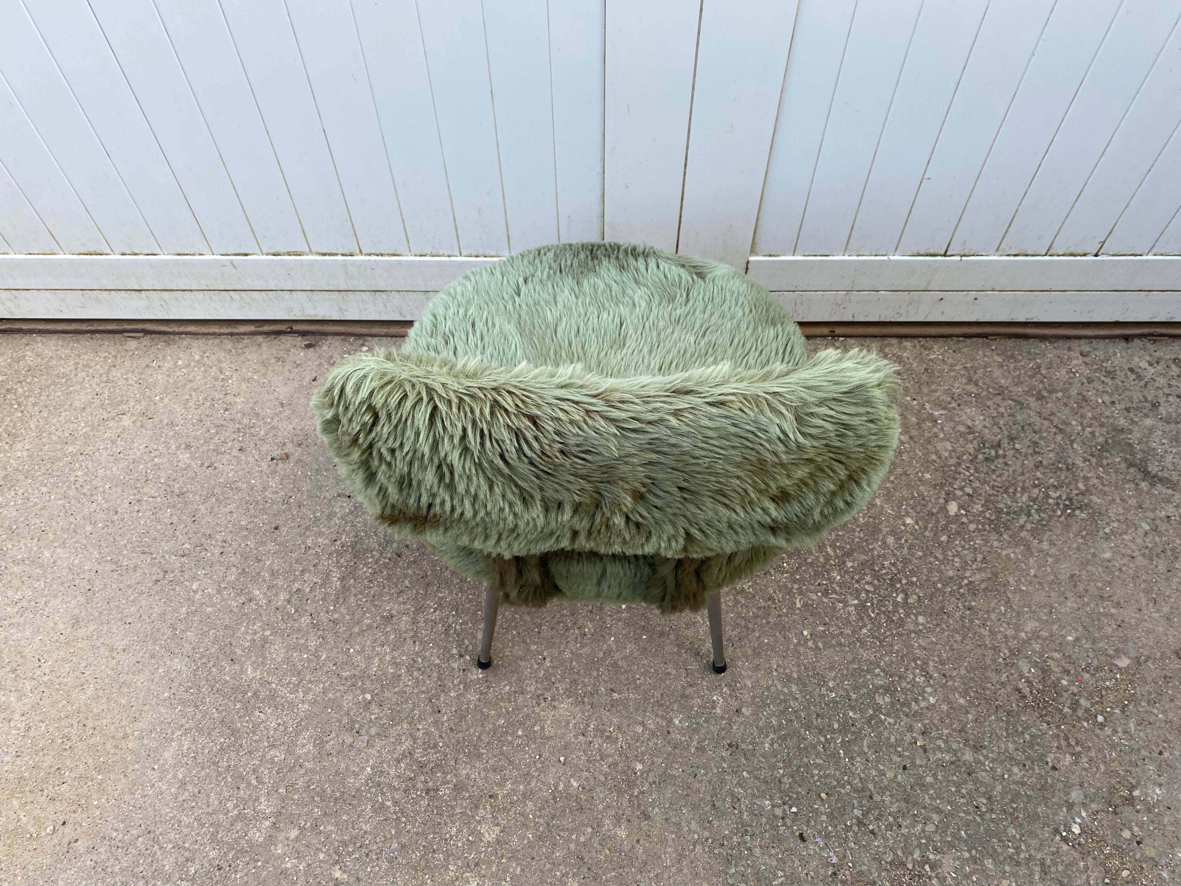 Vintage green furry chair from the 1960s