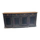 Old sideboard with four doors and four drawers