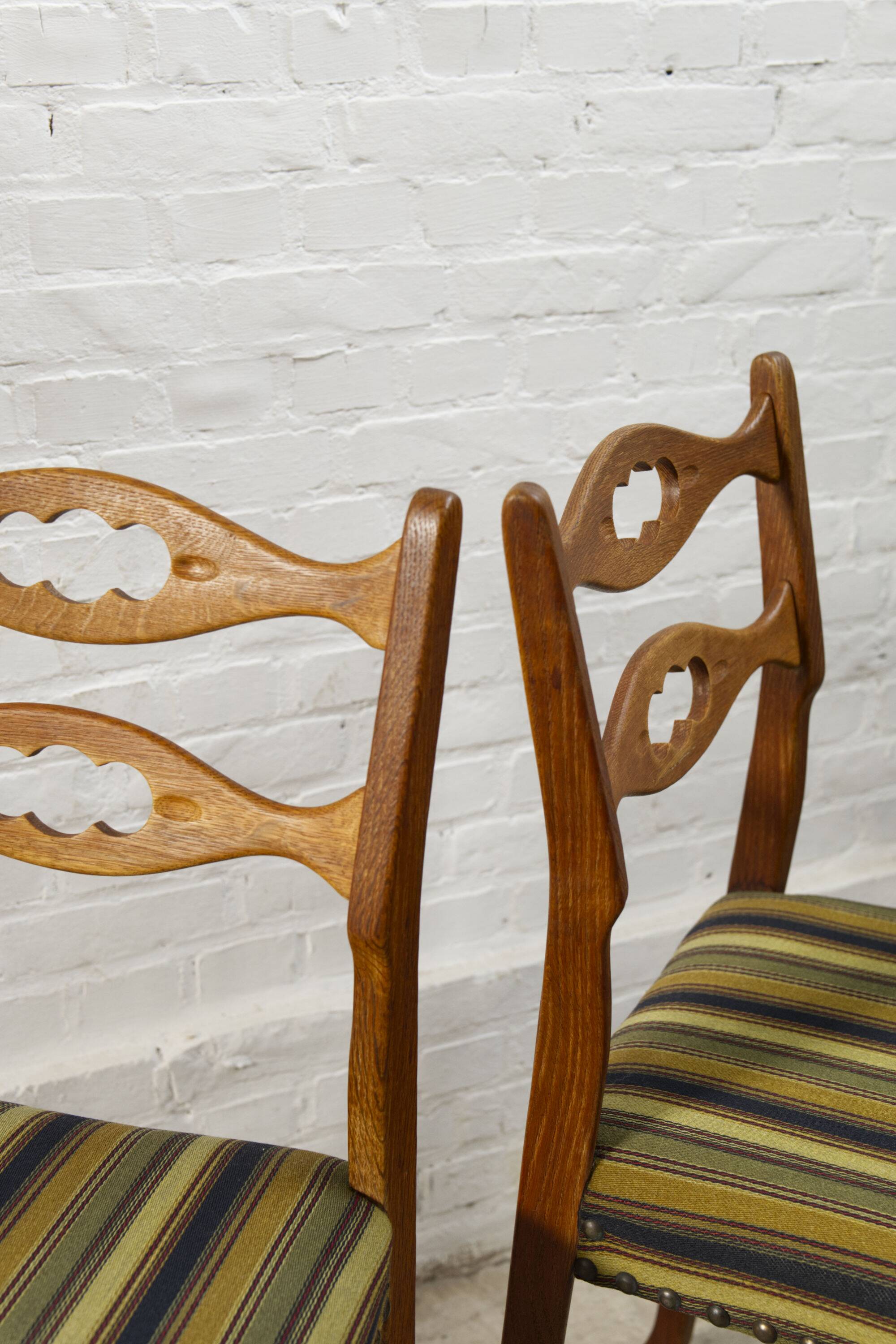 Set of four oak and wool dining room chairs by Henning Kjaernulf, 1960's