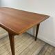 Vintage Scandinavian teak dining table 1970s – 2 integrated extensions